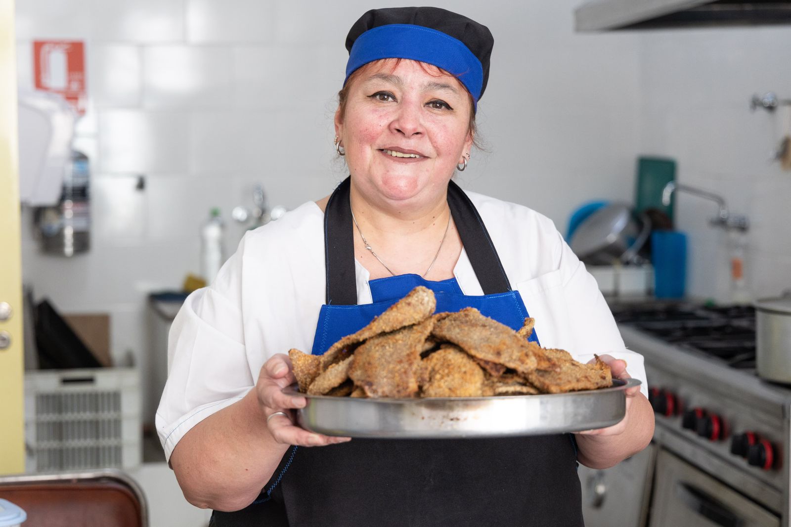 Hace las mejores milanesas de La Boca en un predio que era del pintor Benito Quinquela Martín