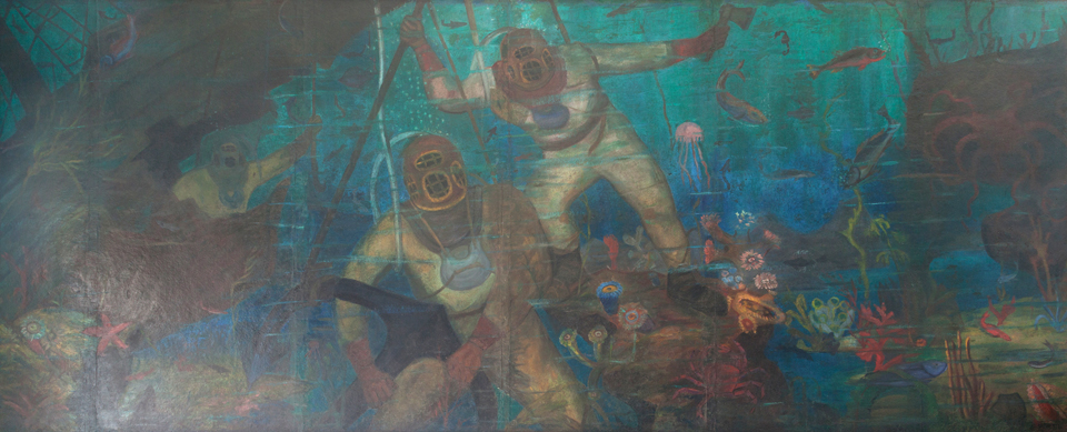 Buzos en el fondo del mar después de la restauración